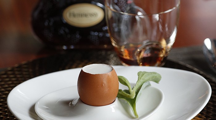 The opening 'egg' course — almond milk, torch ginger, oyster leaf, ice plant