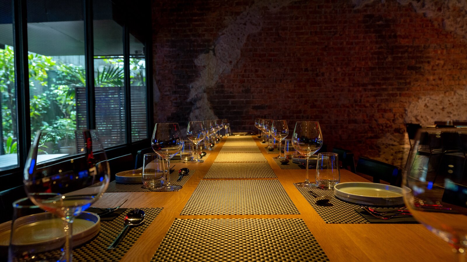 MeatMore dining room — the SoHo discipline held in the architecture.